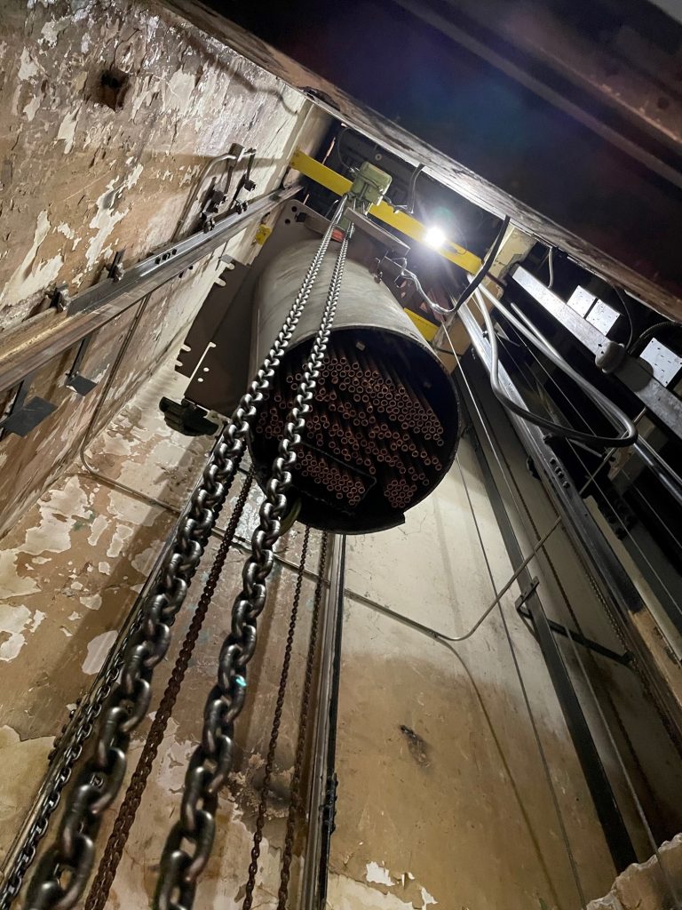 LGH chain hoists help lower chiller down elevator shaft