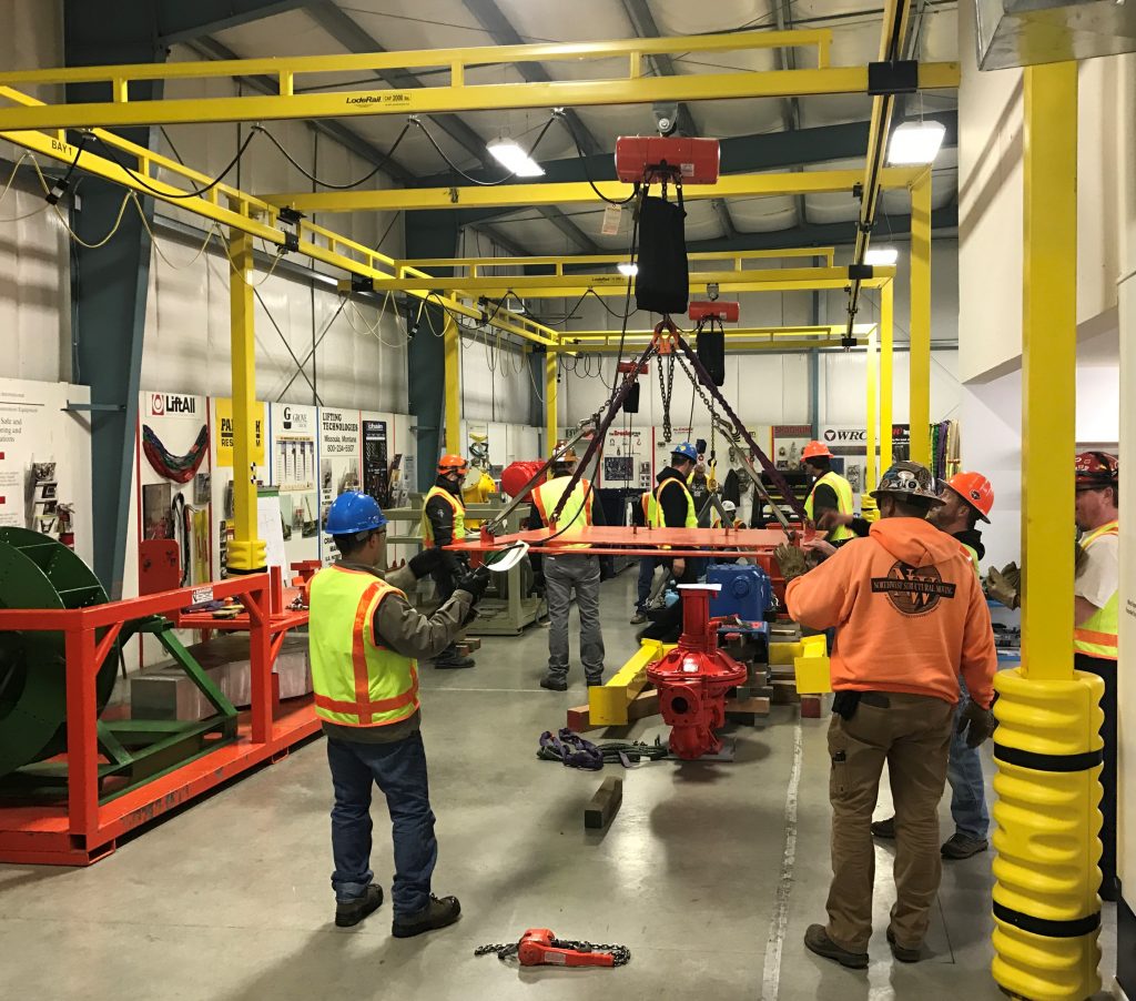 workers dressed in safety gear training during an ITI Masters Riggers conference 