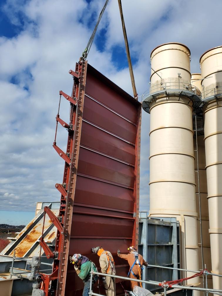 Riggs Distler installing a damper a New Jersey Power plant with rigging from LGH.